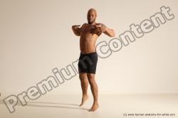 Underwear Gymnastic poses Man Black Muscular Bald Dancing Dynamic poses Academic